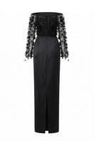 Black Yvette tulle and royal taffeta gown by 21Six, featuring elegant layered tulle skirt and fitted bodice.