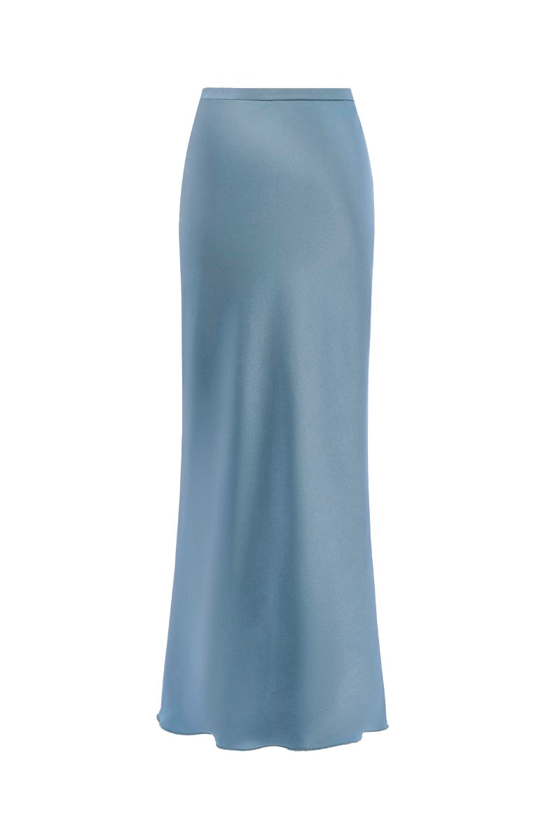 LEKIEU Genova Blue Midi Skirt displayed with a fitted waist and flowing fabric, styled for casual or formal wear.