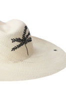 White Sunrise hat by Pájara Pinta, stylish wide-brim hat with a natural woven texture and a decorative band.