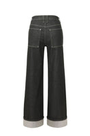 Dark wash Kendall jeans by TT Studios, slim fit denim with classic five-pocket design and subtle stitching details.