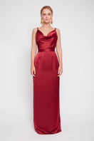 Undress Amila deep red backless gown with flowing fabric and elegant design, perfect for formal occasions.