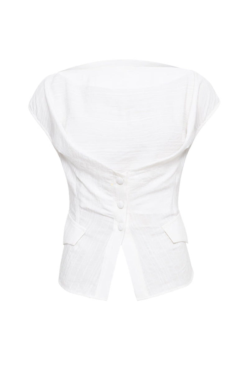 White LIORA Crossline top by SÉLONE, featuring stylish design and fitted silhouette, shown on a model.