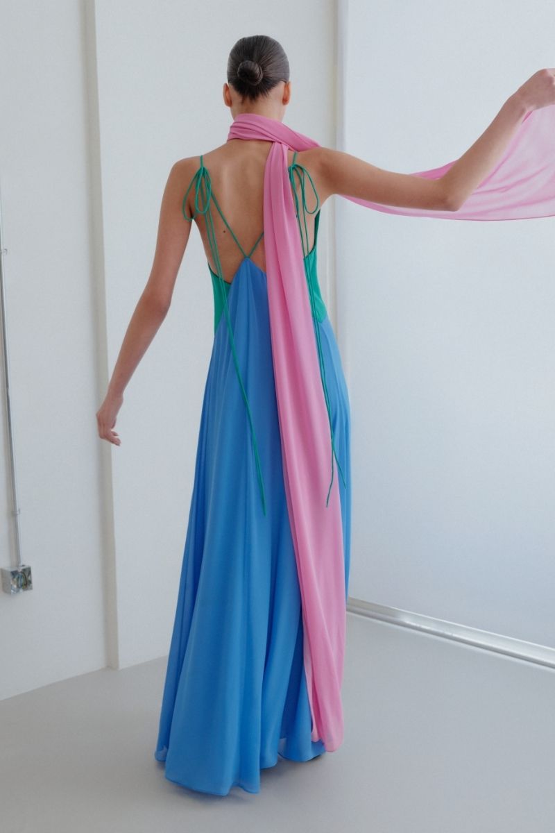 Sisters Tiffany maxi dress in dreamy pastel colors, flowing fabric, and elegant design perfect for summer wear.
