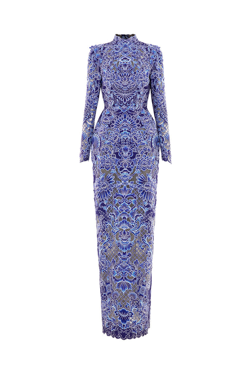 Laser-cut peony gown by Le Thanh Hoa featuring intricate floral design and elegant flowing fabric.