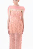 Peach beaded sheer overlay gown by Happy Clothing featuring intricate beadwork and elegant flowing fabric.