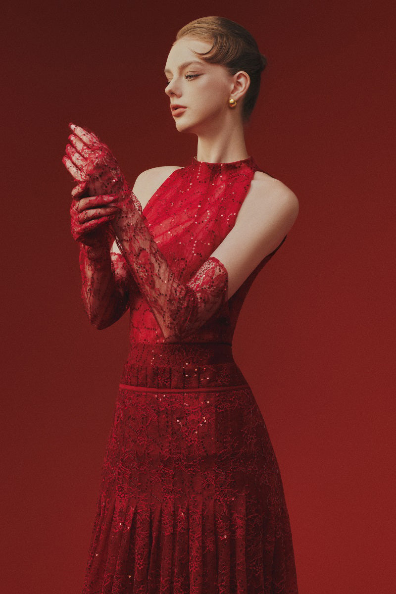 Elegant lace maxi dress by Margée Atelier featuring intricate lace details and a flowing silhouette.