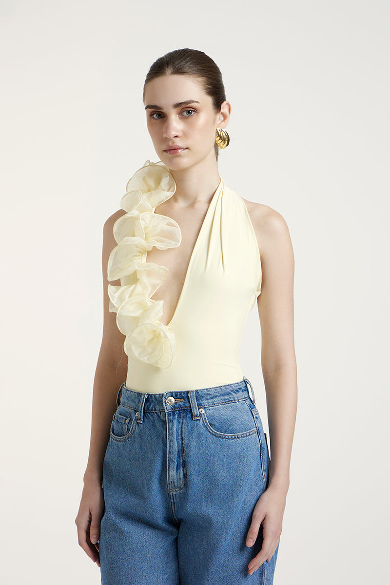 Deme By Gabriella Peony Top in butter yellow, a stylish sleeveless top with flowy fabric and floral design for women's fashion.