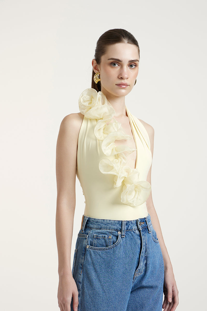 Deme By Gabriella Peony Top in Butter Yellow, a stylish women's blouse with ruffled details and short sleeves.