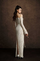 Keira Tong embroidered vine maxi dress featuring intricate embroidery and flowing fabric, perfect for elegant summer wear.