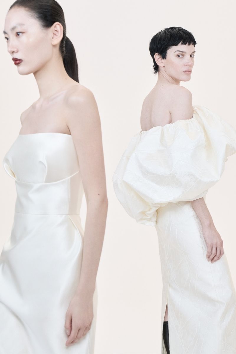 Nihan Peker DANAN gown featuring elegant fabric with intricate detailing, displayed on a mannequin.