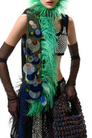 Hand-knitted green embellished scarf by Lalo, showcasing intricate knit pattern and decorative details in a close-up view.