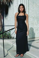 Black Jilliane maxi dress by Summer Away, flowing fabric and elegant design, shown on a model.