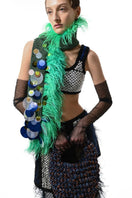 Hand-knitted embellished green scarf by Lalo, featuring intricate embroidery and cozy, soft wool fabric.