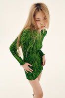 Green printed mini skirt from Chictopia featuring shirred details and a fitted waist, perfect for casual or stylish looks.
