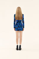 Blue printed mini skirt from Chictopia featuring shirred waist and a stylish, fitted design perfect for casual or dressy outfits.