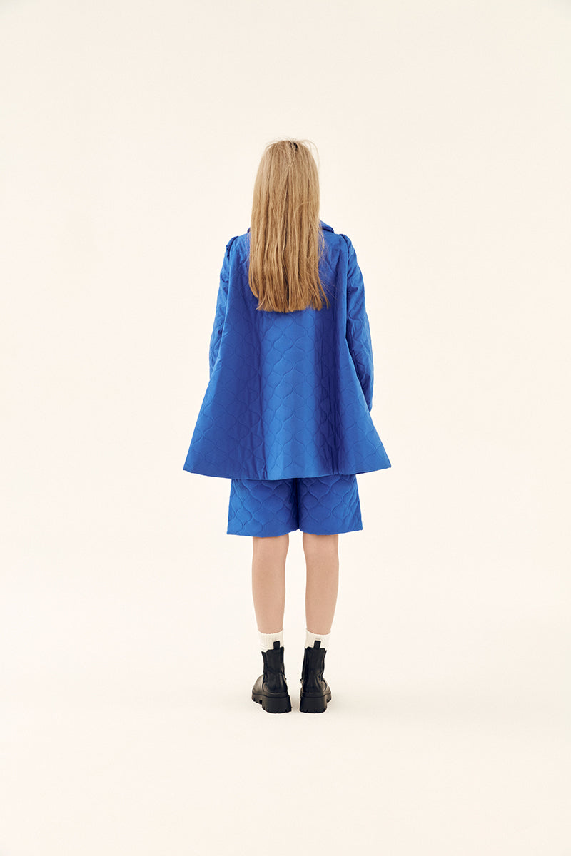 Chictopia blue quilt swing coat jacket with a relaxed fit and quilted design, perfect for stylish winter wear.