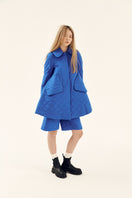 Chictopia blue quilt swing coat for women, stylish jacket with quilted design, perfect for chilly weather.
