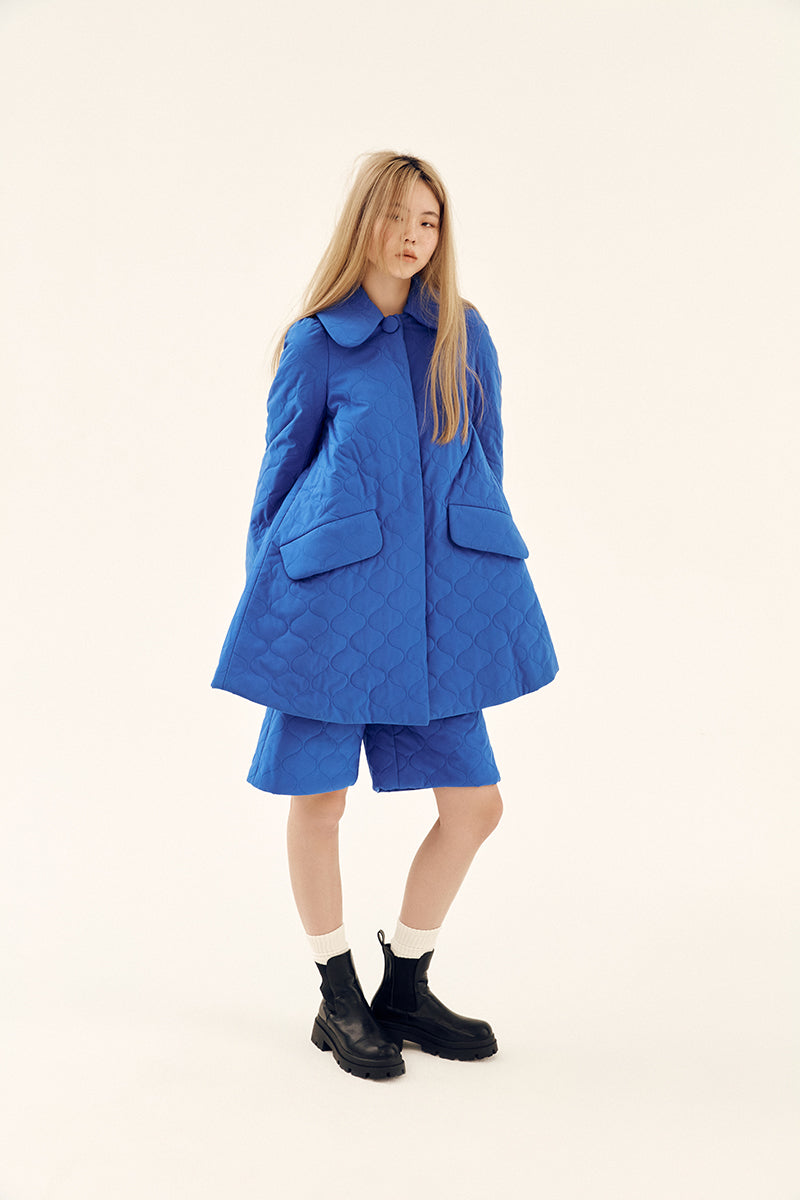 Chictopia blue quilt swing coat for women, stylish jacket with quilted design, perfect for chilly weather.