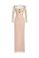 White Bow Cut Out Laces Maxi Dress by Montsand, flowing maxi dress with bow accents and cut-out lace details, perfect for elegant occasions.