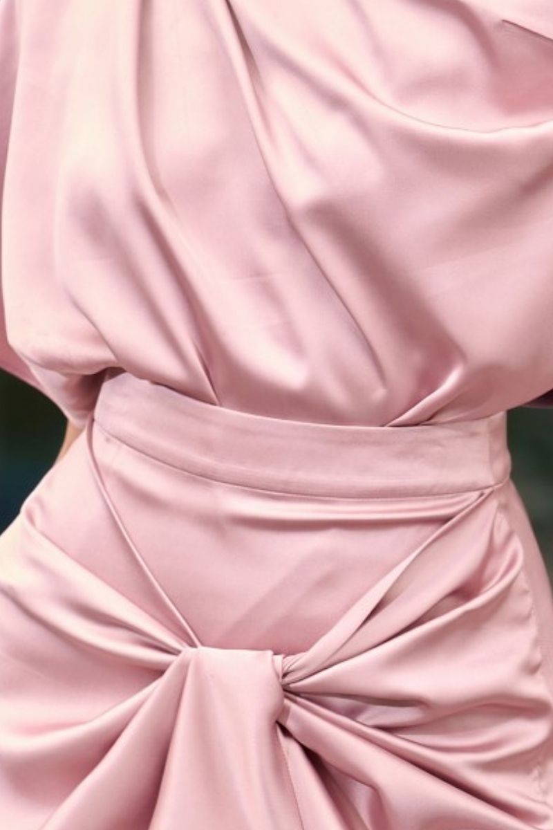 Aubrie draped asymmetrical top and Jessie knotted skirt co-ord set by 21Six, featuring sleek, stylish fabric and modern design.