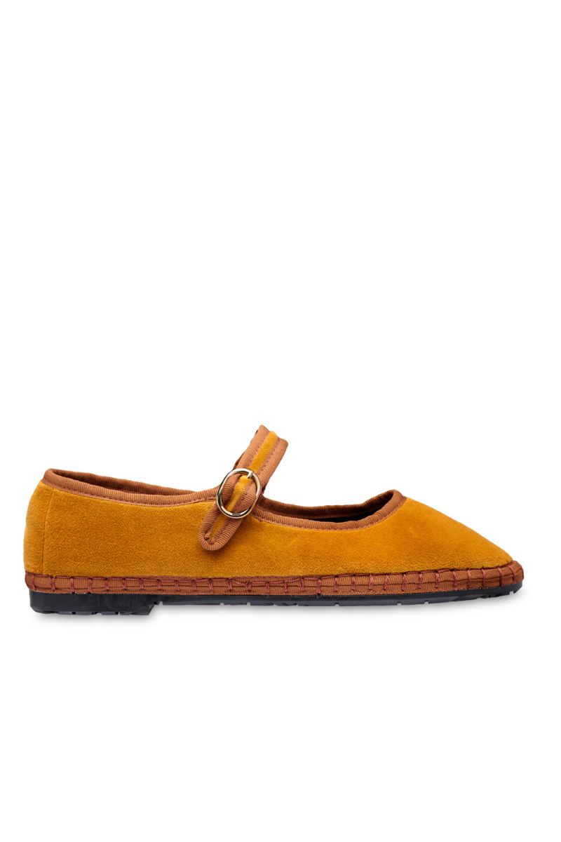 Flabelus Amaranta mustard flats with light brown piping, stylish slip-on shoes with a sleek design and comfortable fit.