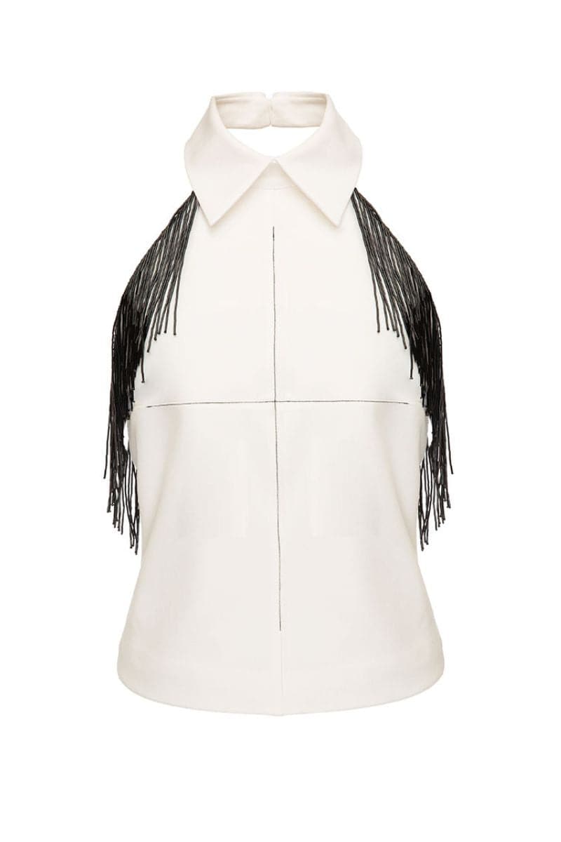 White Vaska top with beaded fringe, featuring a stylish sleeveless design and intricate bead detailing on the fringe.