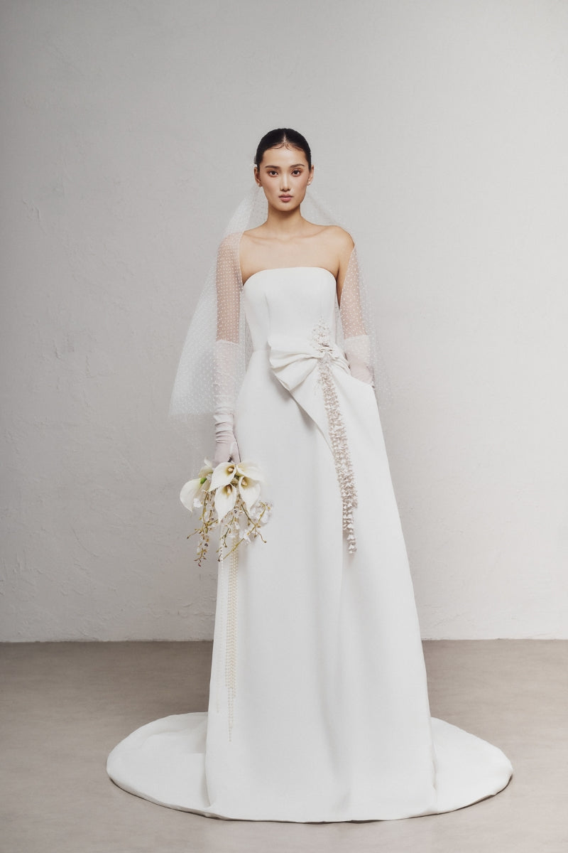 White Plan LEEJEI maxi dress featuring a flowy silhouette and elegant design, perfect for casual or formal wear.