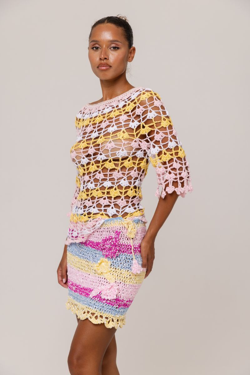 Andreeva Bird of Paradise handmade mini crochet skirt, featuring intricate floral designs and a fitted waist, perfect for summer wear.