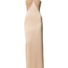 Gold Phan Huy long bodycon gown with sculpted bust, fitted silhouette, and elegant design on a model.