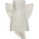 BAÉ Joy white mini dress with large bow, stylish short dress featuring a feminine silhouette and playful detail.