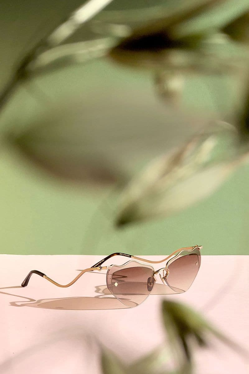 Brown Forget Me Not sunglasses by Moy Atelier featuring stylish frames and tinted lenses for a fashionable look.