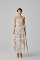 Beige Octavia lace gown by 21Six featuring intricate lace details and a flowing silhouette.