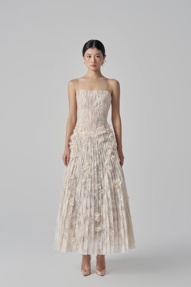 Beige Octavia lace gown by 21Six featuring intricate lace details and a flowing silhouette.