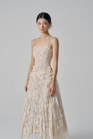 Beige Octavia lace gown by 21Six featuring intricate lace details and a flowing design, perfect for elegant occasions.