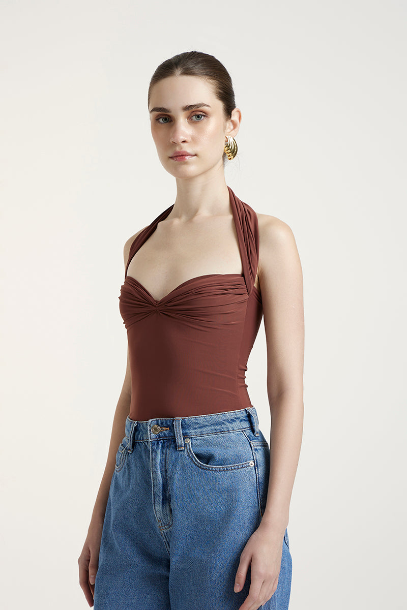 Deme By Gabriella COLE Top in brick color, stylish sleeveless blouse with a relaxed fit, perfect for casual or chic outfits.