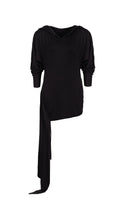 Black hooded mini dress with side train by Kris Marán, featuring a stylish hood and elegant flowing train at the side.