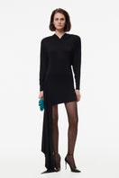 Black hooded mini dress with a side train by Kris Marán, showcasing a sleek and stylish design with a fitted silhouette.