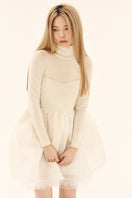 Ethereal ivory silk shirred mini dress by Chictopia, featuring a fitted bodice and flowing skirt with delicate detailing.