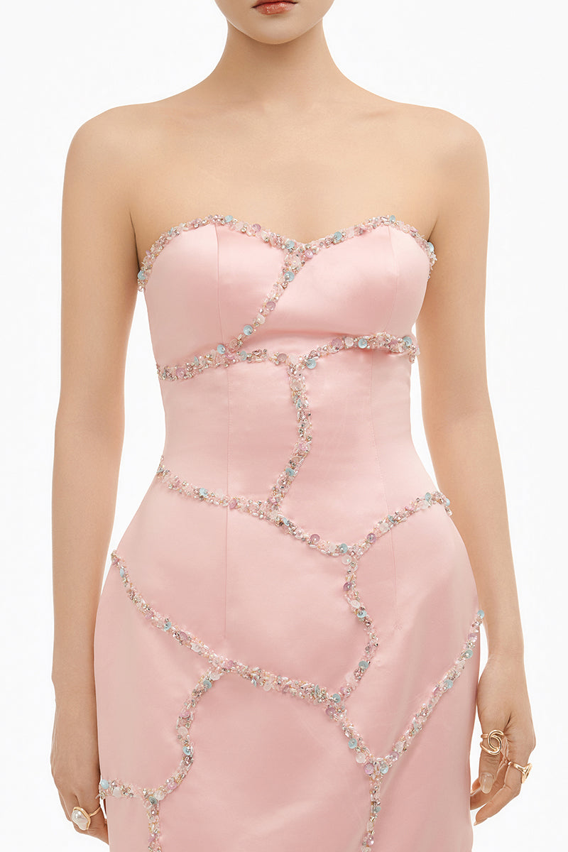 Elegant blush crystal wave strapless gown by Happy Clothing, featuring a flowing design and intricate crystal detailing.