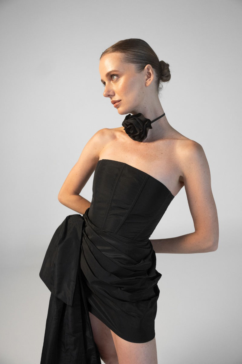 Black Estefania anniversary corset top featuring lace-up front and structured design, perfect for elegant evening wear.