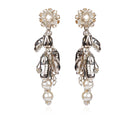 Aidan & Ice Neilla silver earrings featuring sleek, modern design with polished silver finish, displayed on a white background.
