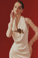 Elegant HANAH gown by Margée Atelier featuring flowing fabric and intricate detailing, perfect for formal occasions.