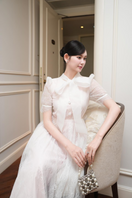 White Plan ILLEN midi dress featuring a flowy fabric, sleeveless design, and elegant silhouette perfect for summer wear.