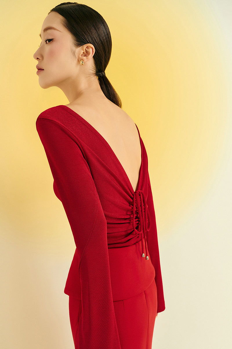 Red Twinkle Knit Top by EEGEN Studio featuring a cozy, textured knit fabric and a stylish, fitted design.