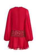 CEM deep V-neck chiffon mini dress showing flowy fabric and stylish design, perfect for casual or semi-formal occasions.