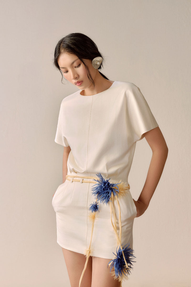 Light ivory Bloom mini dress by Lecia featuring a fitted silhouette and short sleeves, perfect for casual or semi-formal occasions.