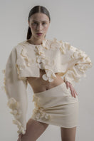 Blikvanger milky floral mini skirt with a fitted waist and colorful flower pattern, styled on a mannequin.