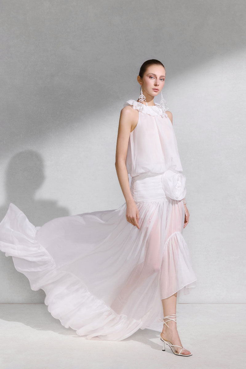 Arti Apparel SALUS maxi dress featuring flowy fabric and a stylish design, perfect for casual or summer wear.