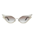Silver Wild at Heart sunglasses by Moy Atelier with bold, animal-inspired frames and dark lenses.