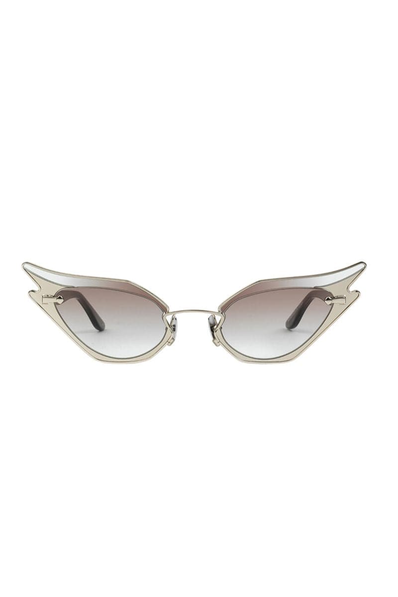 Silver Wild at Heart sunglasses by Moy Atelier with bold, animal-inspired frames and dark lenses.
